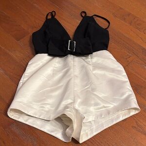 SOLD 
Maeve Black and White Romper with Rhinestone Bow